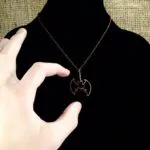 Curved Bat - Lava Stone Pendant