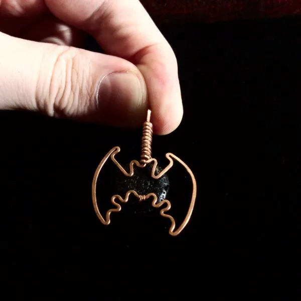 Curved Bat - Lava Stone Pendant